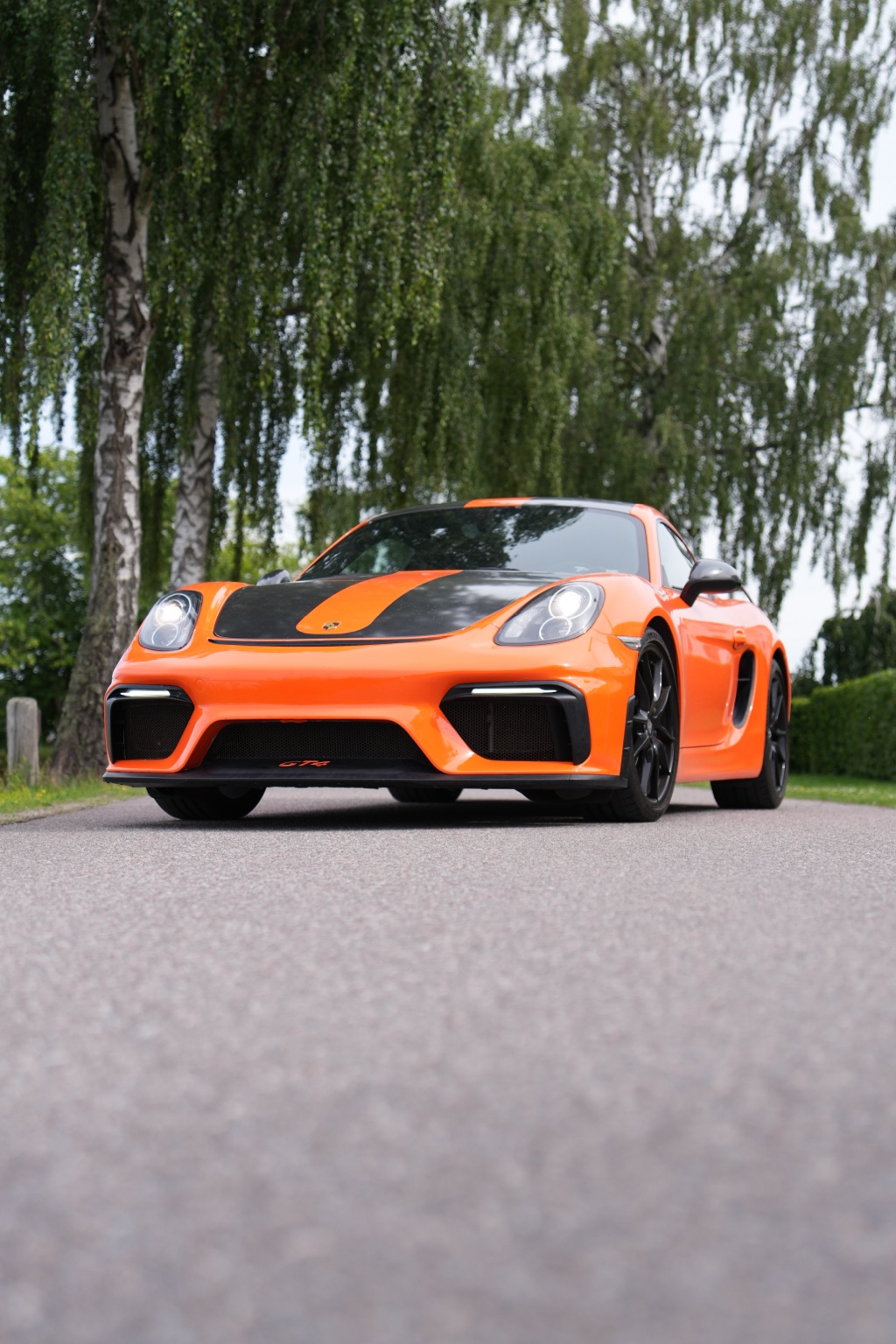 Orange Porsche GT4 front