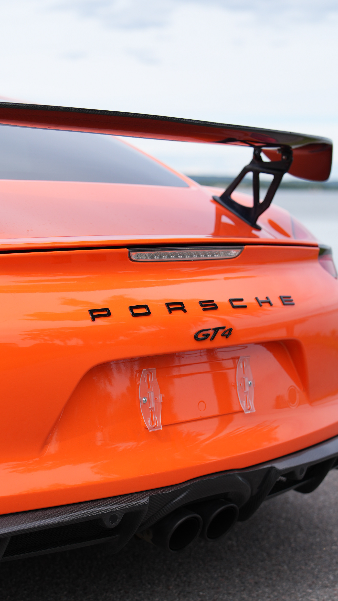 Orange Porsche GT4 rear detail